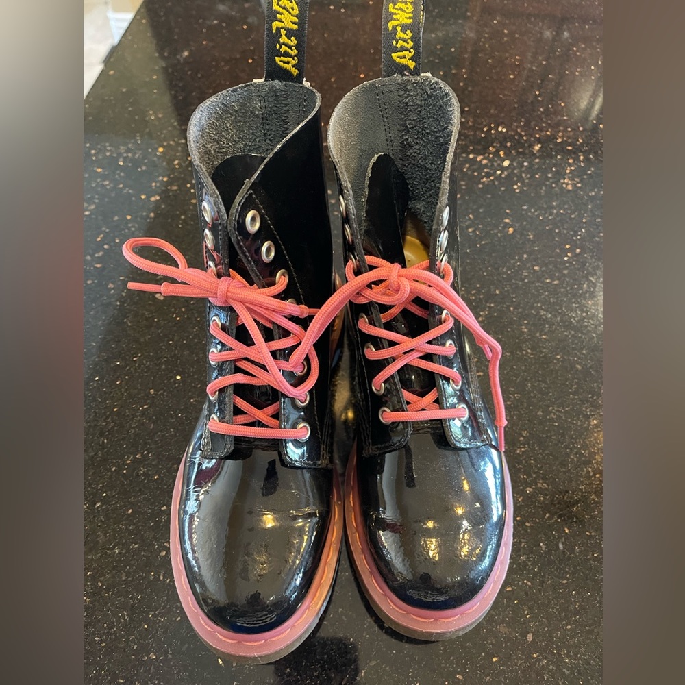 Dr Marten pink and black lace up boots in very good pre-owned condition.